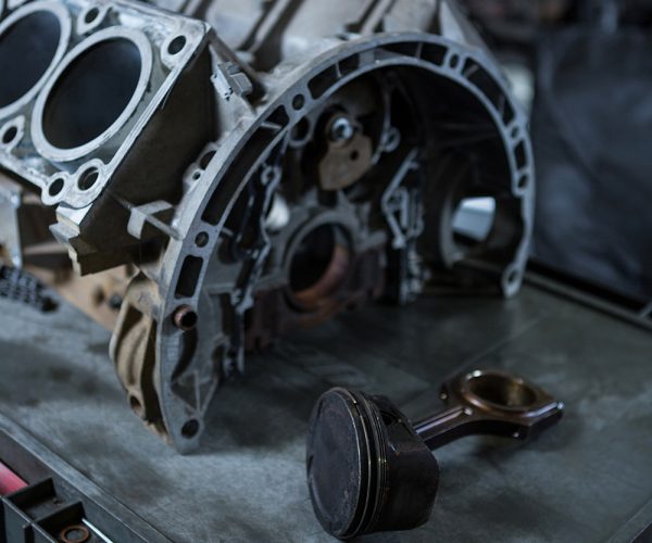 Close-up of car engine at repair garage